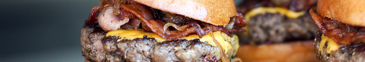 Eating American (Traditional) Burger at The Original Root Beer Stand restaurant in Culver, IN.